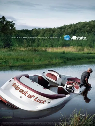 A boat in the water with an advertisement for allstate.