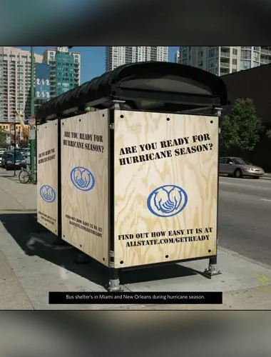 A bus stop with a sign that says are you ready for hurricane season